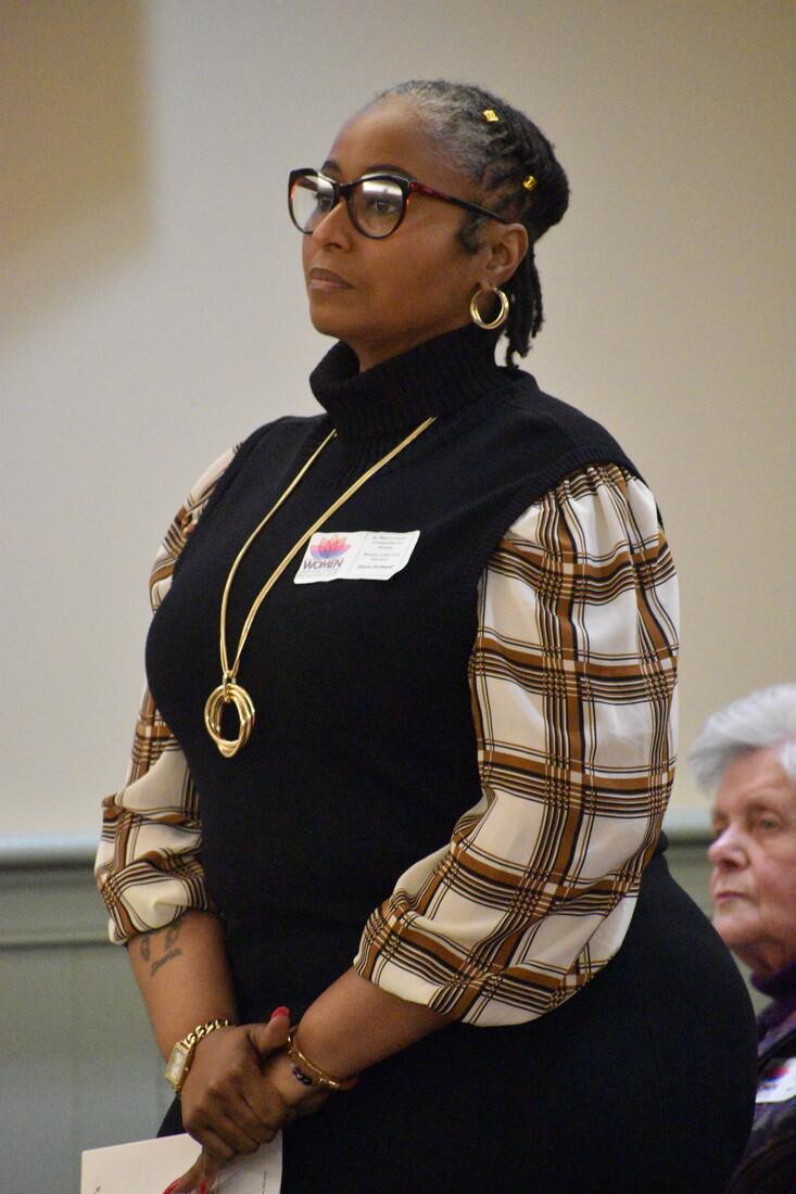Branch member speaking at a community forum